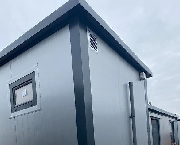 Contenedor Sanitario Modular con Doble Cabina WC y Lavamanos