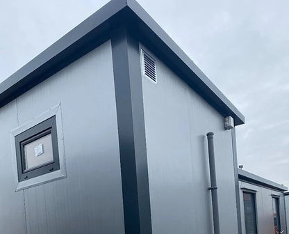 Contenedor Sanitario Modular con Doble Cabina WC y Lavamanos