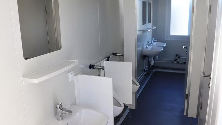 Contenedor Sanitario Móvil de 20 Pies con Instalaciones Sanitarias Completas