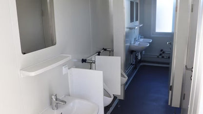 Contenedor Sanitario Móvil de 20 Pies con Instalaciones Sanitarias Completas